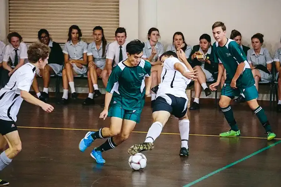 Students playing basketball